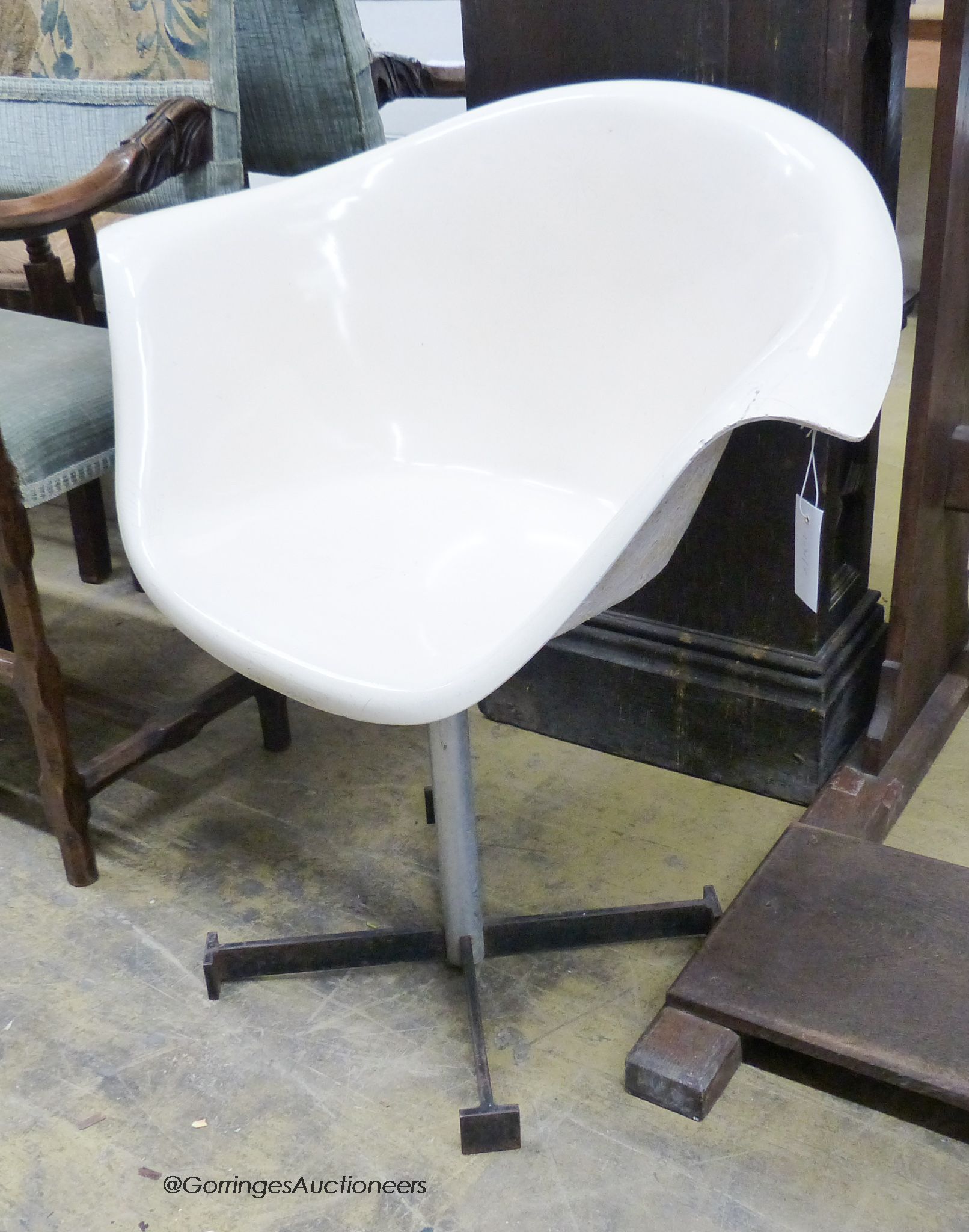 A mid century elbow chair